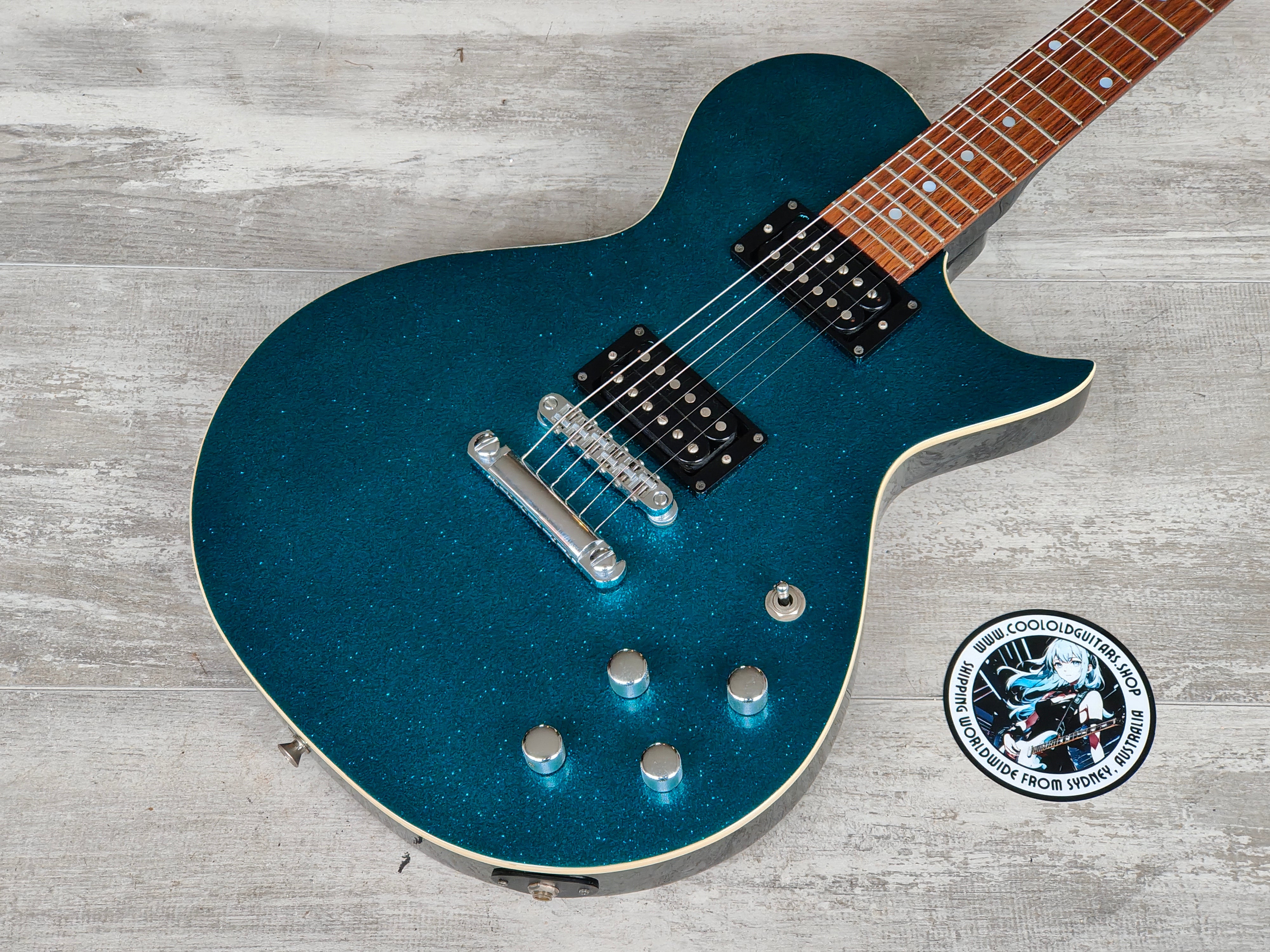 1999 Burny Japan LS-65 Single Cutaway (Blue Sparkle)